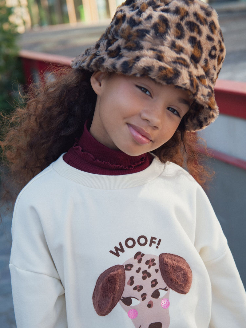 Sudadera crema con animación de perro para niña