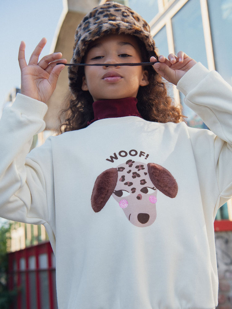 Sudadera crema con animación de perro para niña