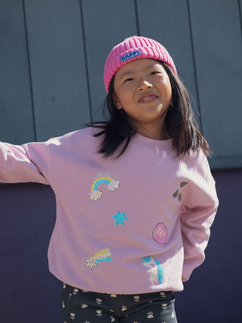 Sudadera rosa con animaciones de fantasía
