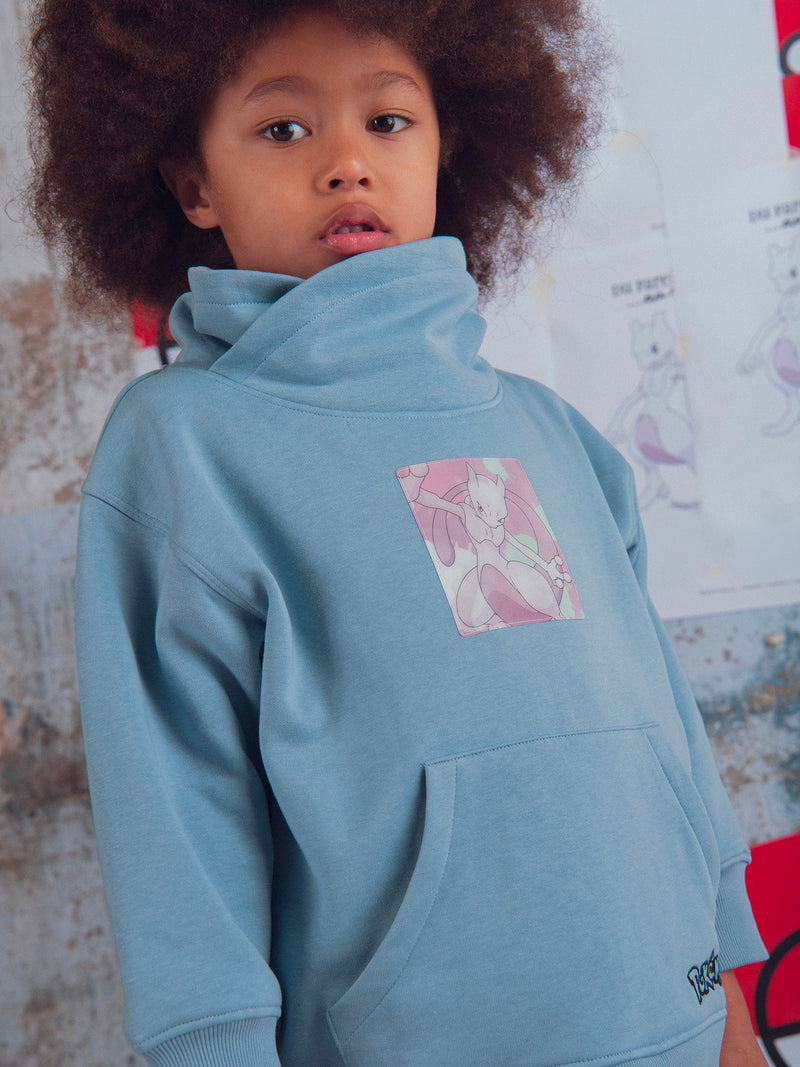 Sudadera azul con insignia Pokémon Mewtwo