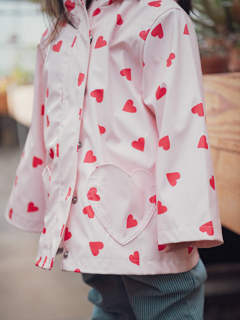 Imperméable rosa con estampado de corazones para bebé niña