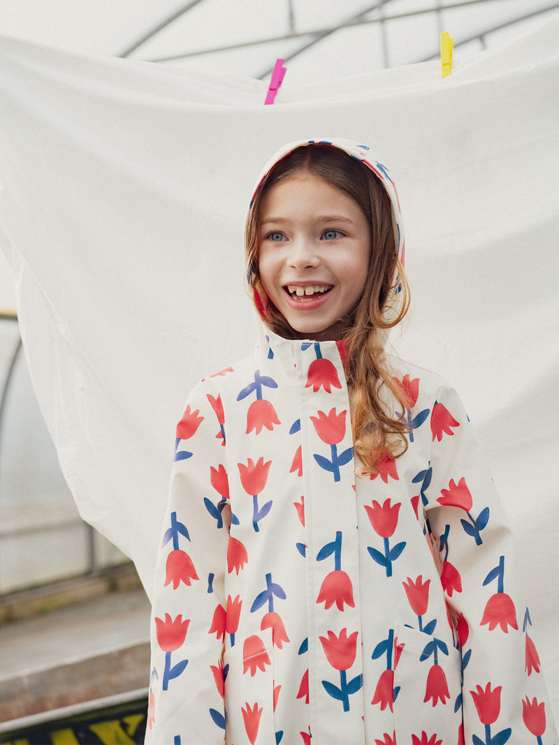 Impermeable ecru con estampado de flores para niñas