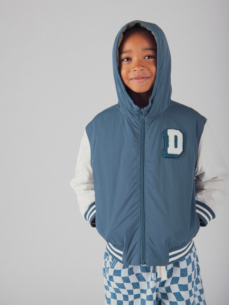 Chaqueta reversible azul y verde para niños