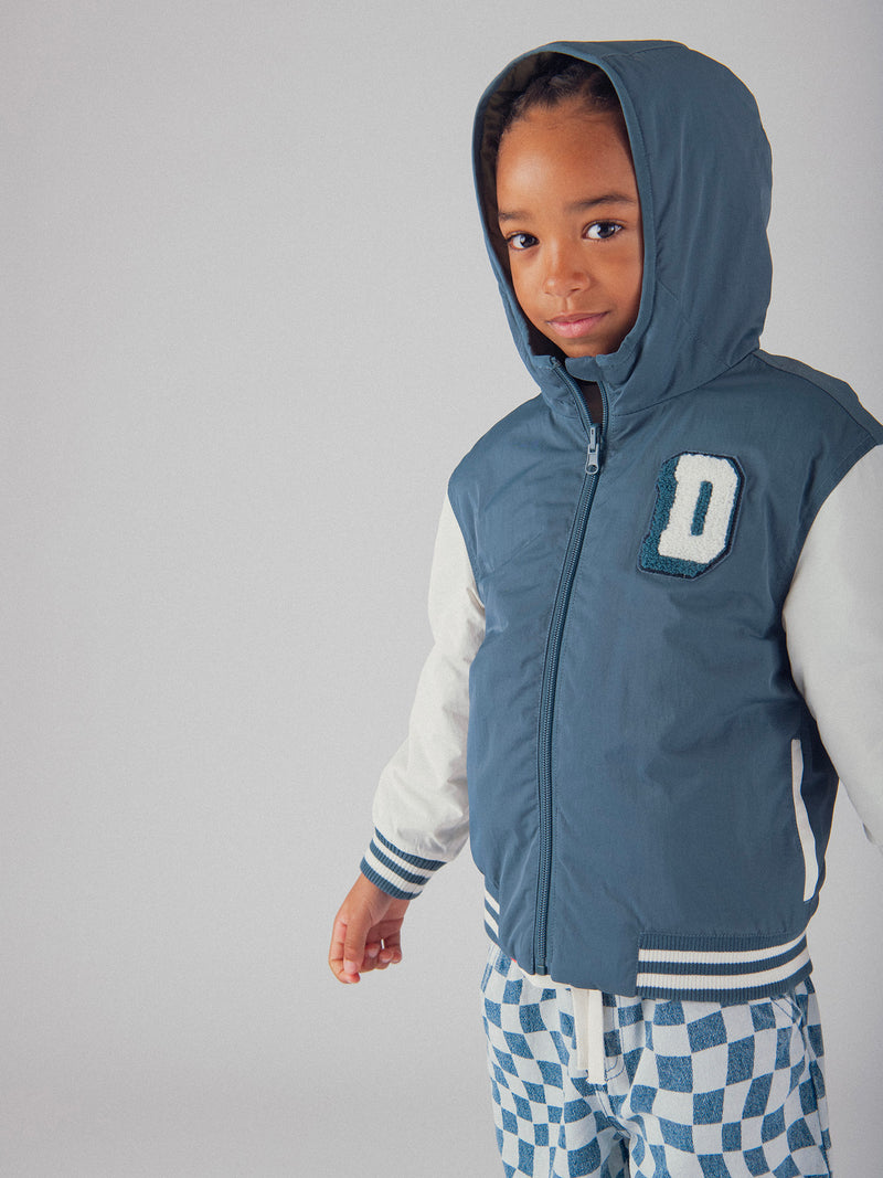Chaqueta reversible azul y verde para niños