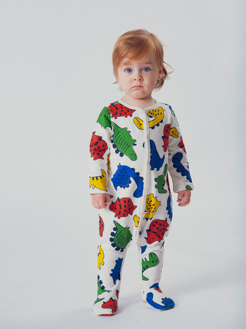 Monito de ecru con estampado de dinosaurios para bebé niño