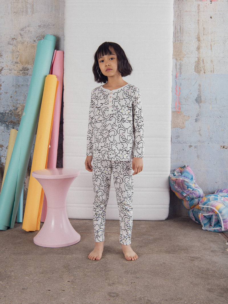 Pijama largo crema con estampado integral "DREAM" para niña
