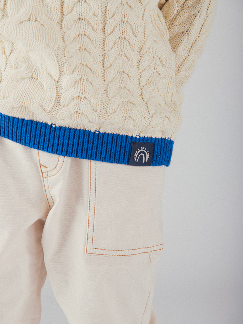 Suéter Beige con Detalles Azules para Niños