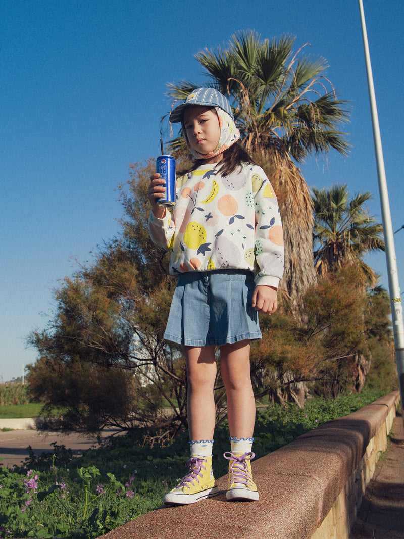 Falda corta plisada en denim para niñas