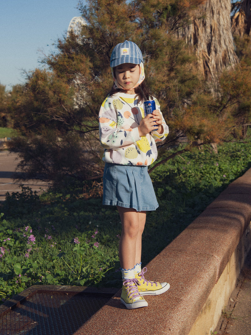 Falda corta plisada en denim para niñas