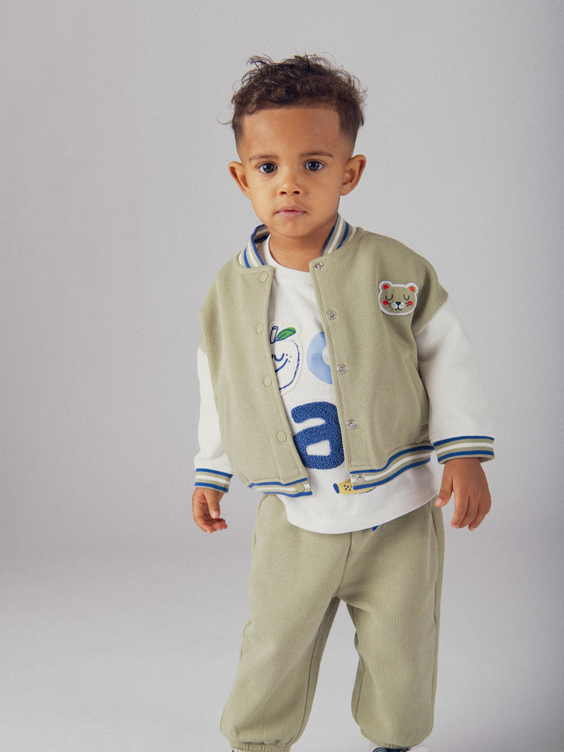 Pantalones sporty kaki con tigre para bebé chico