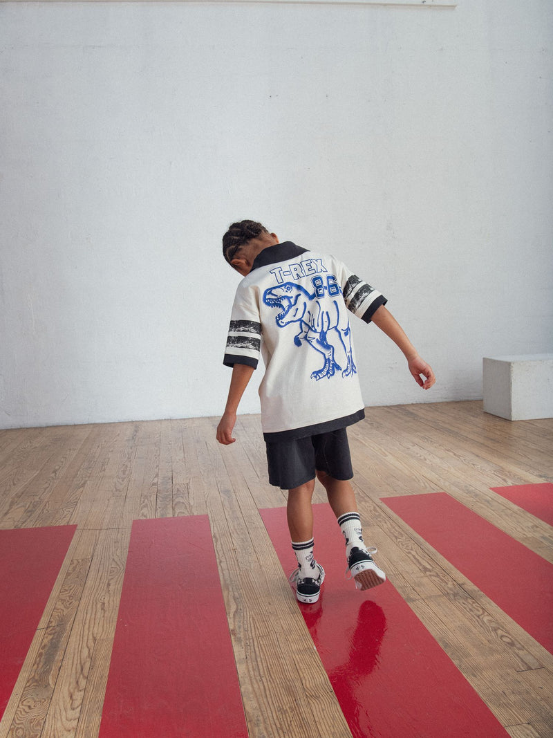 Camiseta beige con animación de T-Rex para niño