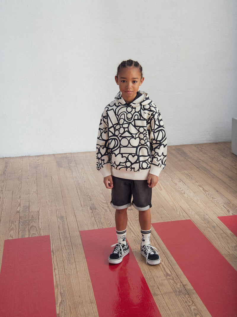 Sudadera crema con estampado gráfico para niño