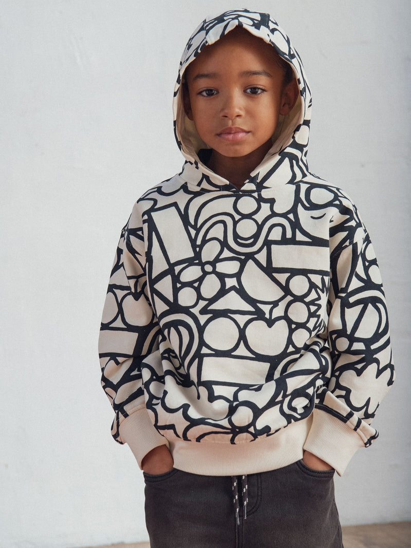 Sudadera crema con estampado gráfico para niño