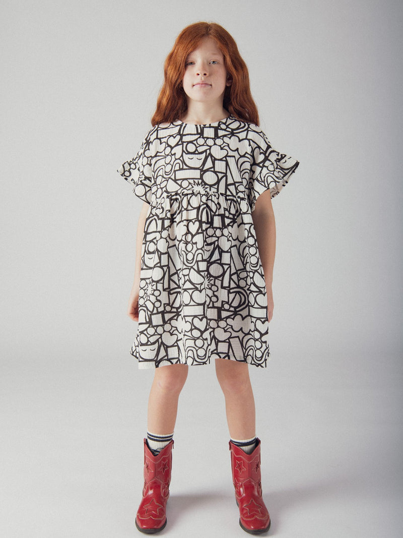Vestido écru con estampado gráfico para niña