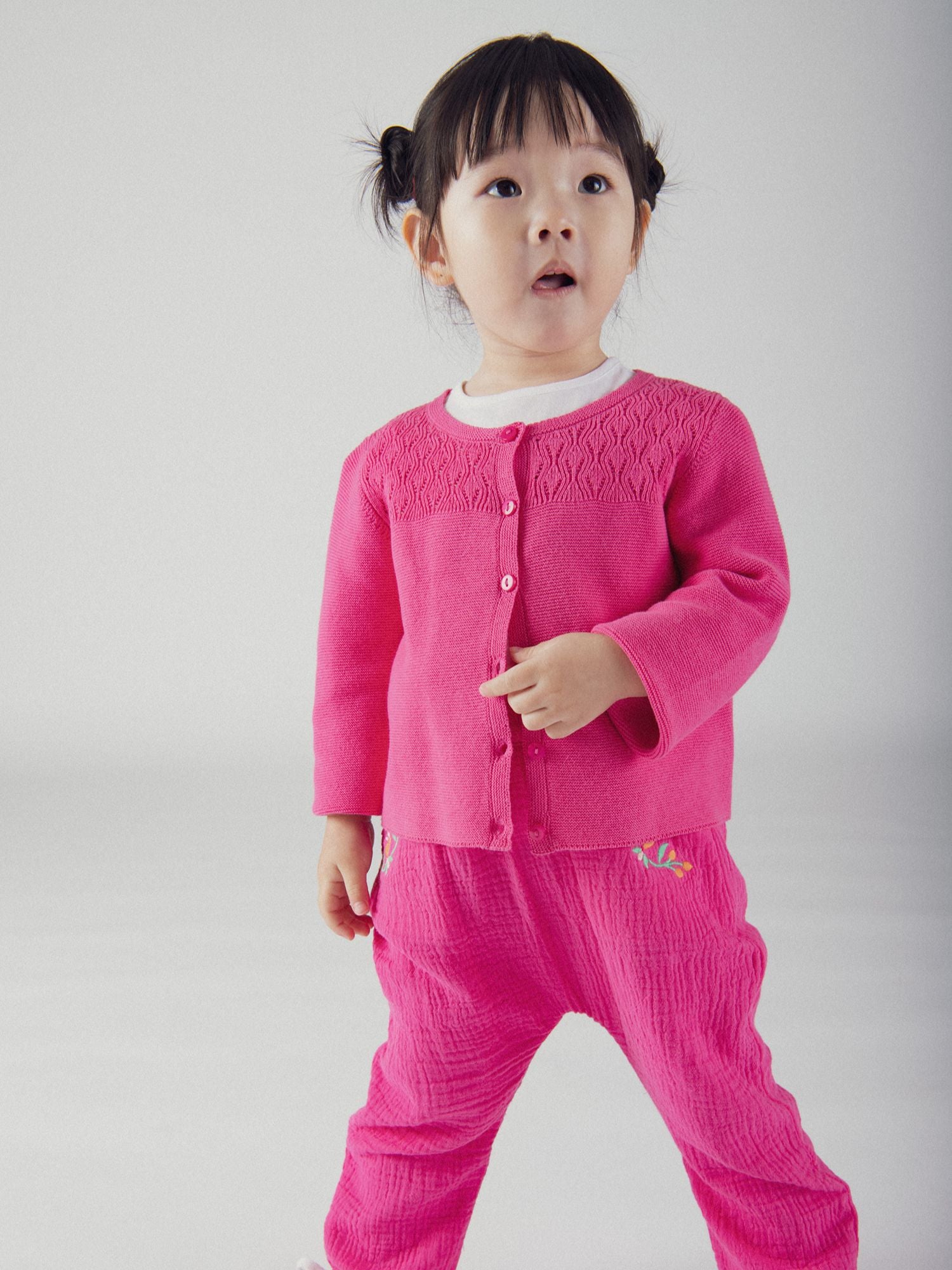 Cardigan de punto rosa pasión para bebés