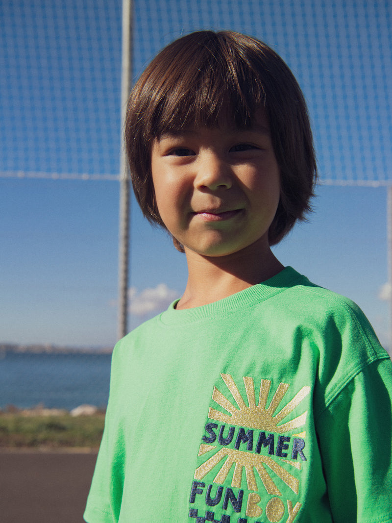 Conjunto verde con animación de sol para niño