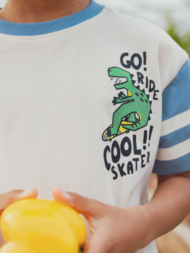 Camiseta de color ecru con animación de dinosaurios para niños