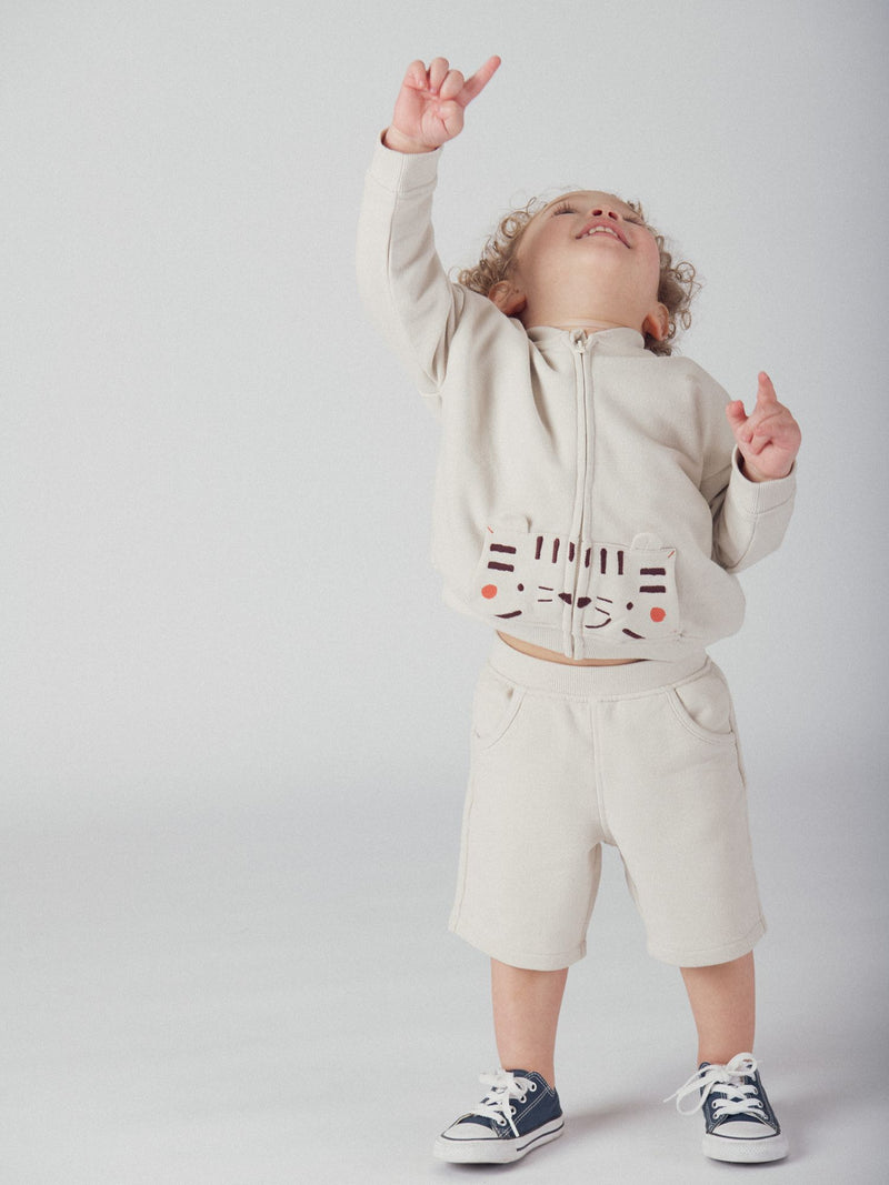 Chaleco beige con cremallera y motivo "Tigre" para niño