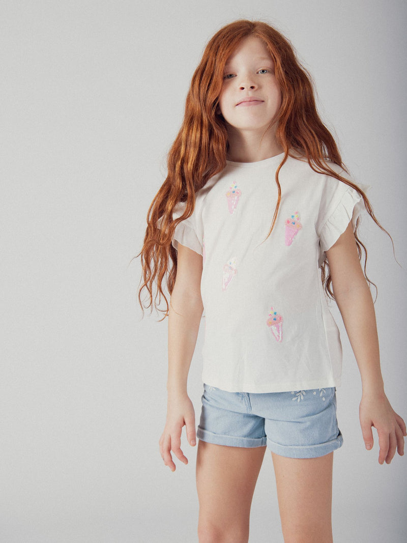Shorts de denim azul con bordados florales para chicas
