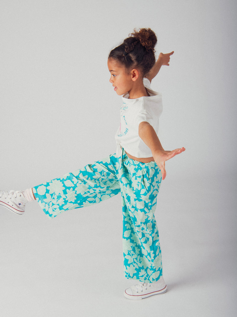 Pantalón azul impreso floral para niña