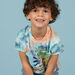 Camiseta tie-dye con estampado de dinosaurio para niño