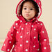 Impermeable con capucha con estampado de lunares