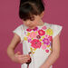 Camiseta con dibujo de flamenco con lentejuelas de color crudo, para niña